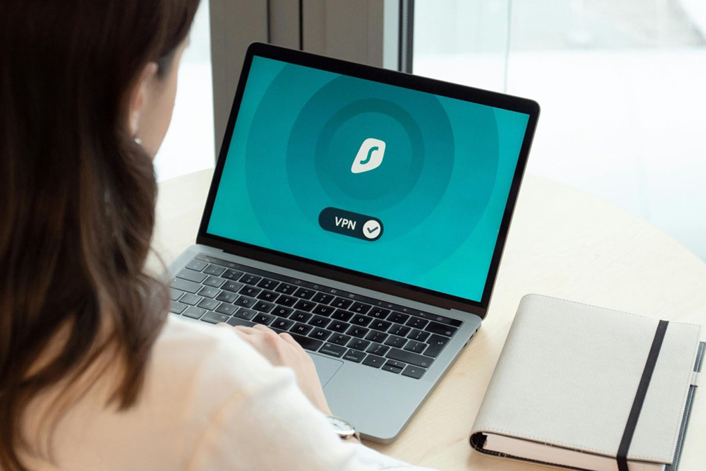 A woman working from her laptop