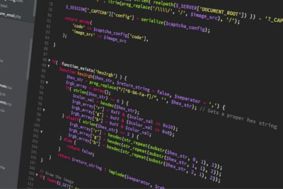 HTML code displaying on a laptop screen