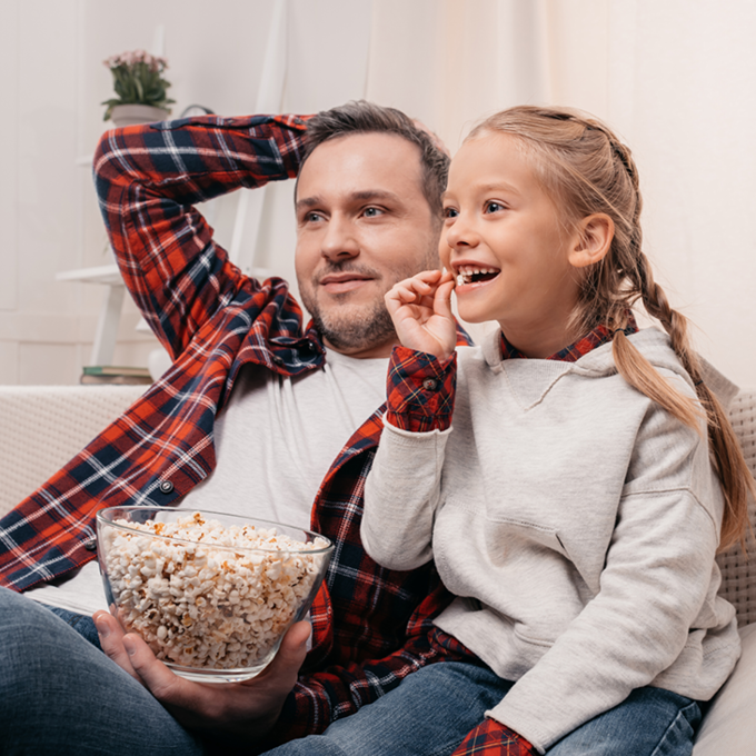 Woman watching Glo Fiber TV