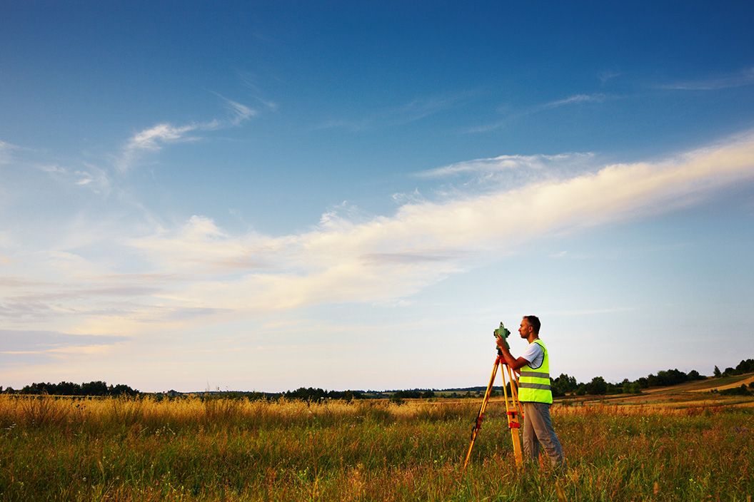 Shippensburg business surveying an open field